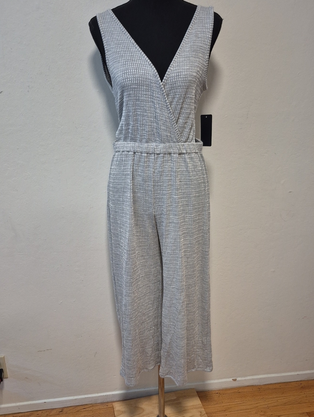NWT Caution to the Wind gray and white grid surplice jumpsuit Sz M